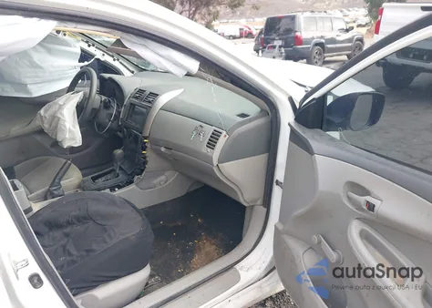 2009 Toyota Corolla из США, поврежденный, VIN JTDBL40E399044487